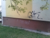 Poškození fasády graffiti (strana u jeslí)